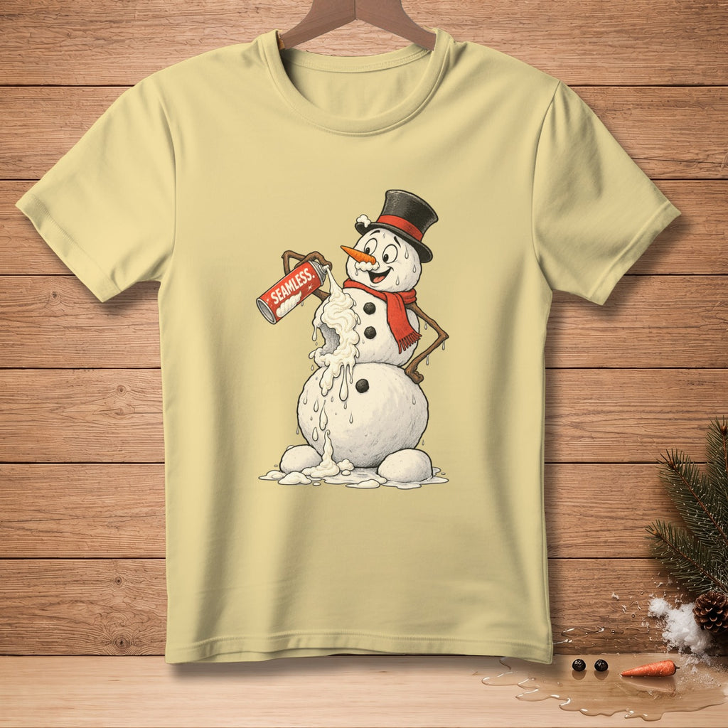 Light yellow t-shirt with a melting snowman spraying whipped cream from a can labeled "SEAMLESS."