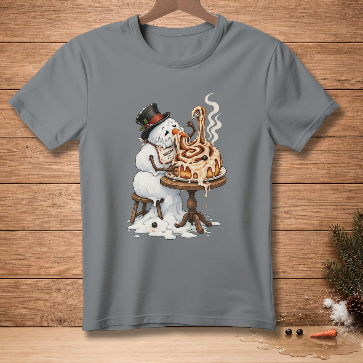Snowman in hat and apron eating cinnamon roll with fork, text reads "Worth It."
