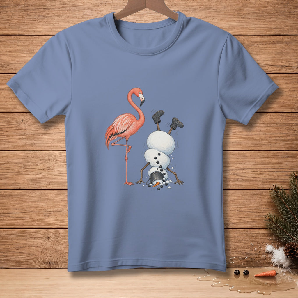 Flamingo stands next to snowman doing a handstand with falling pieces.