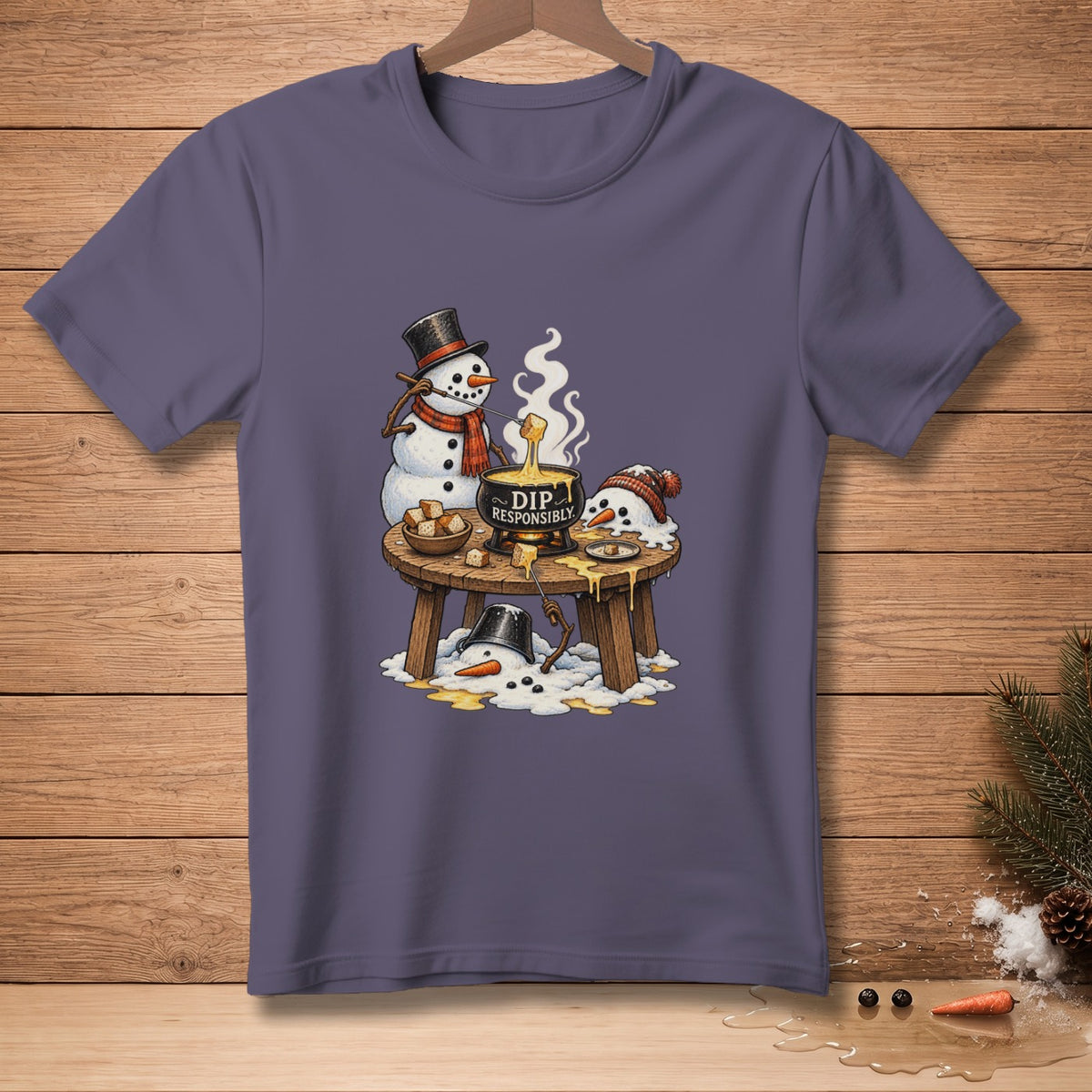 Snowmen dipping bread into fondue with text "DIP RESPONSIBLY" on pot.