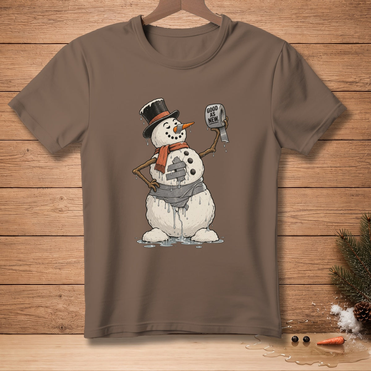 Brown t-shirt with melting snowman holding toilet paper that says "Good as New."
