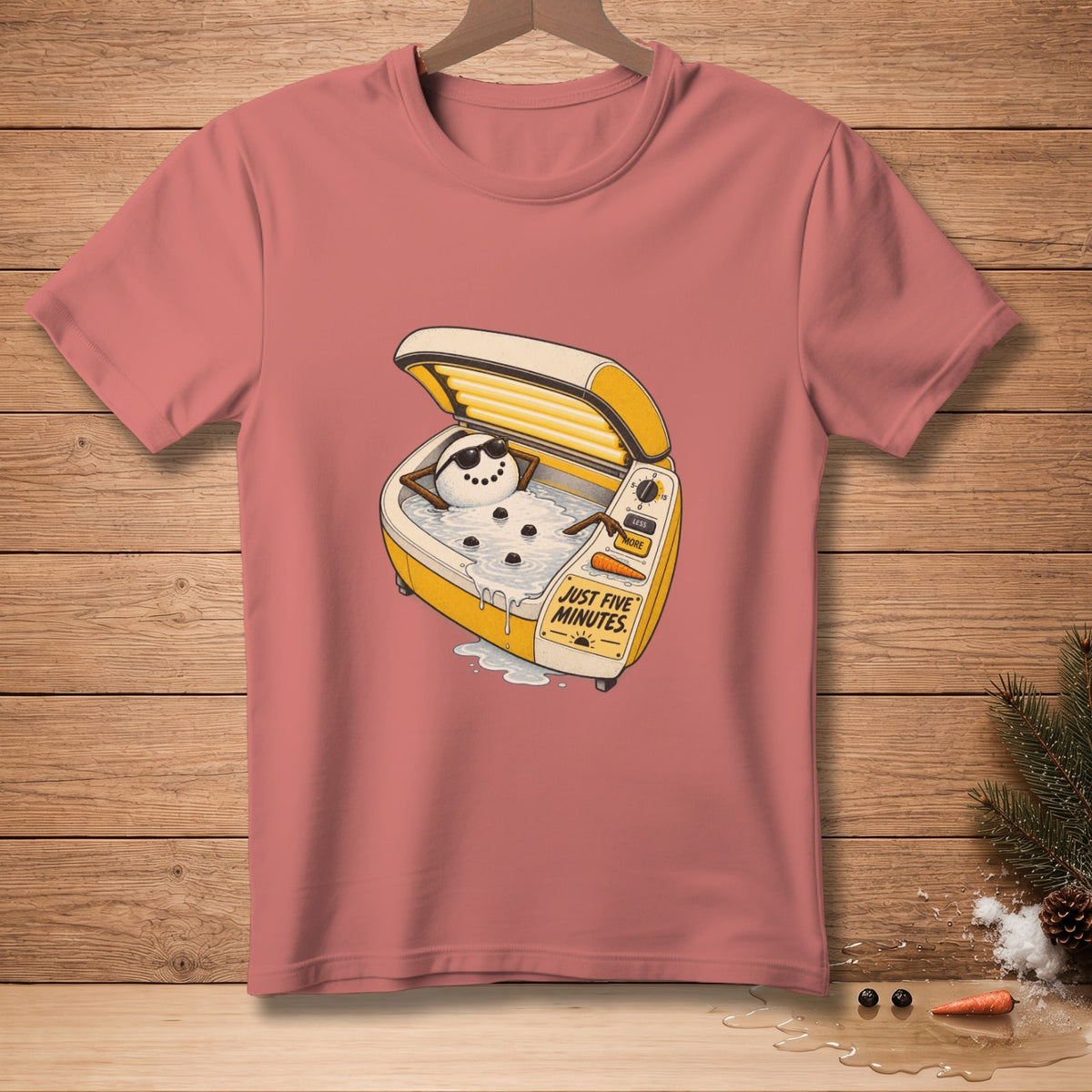 T-shirt graphic of a melting snowman wearing sunglasses in a tanning bed with "JUST FIVE MINUTES."