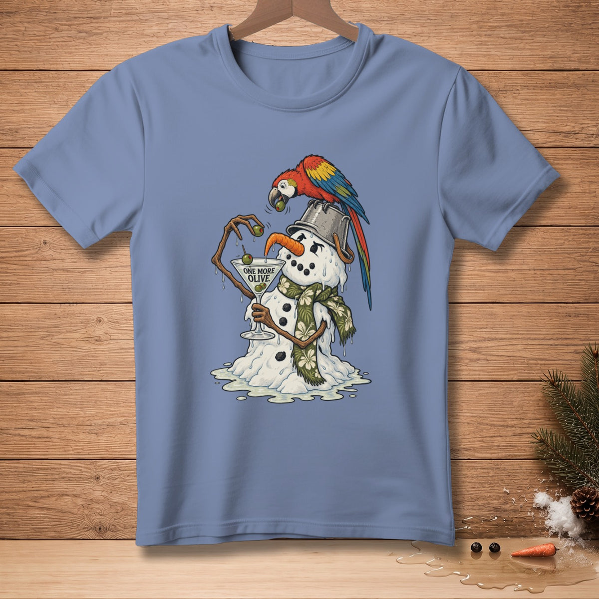 Melting snowman with parrot on bucket hat holds martini glass with text "One More Olive".