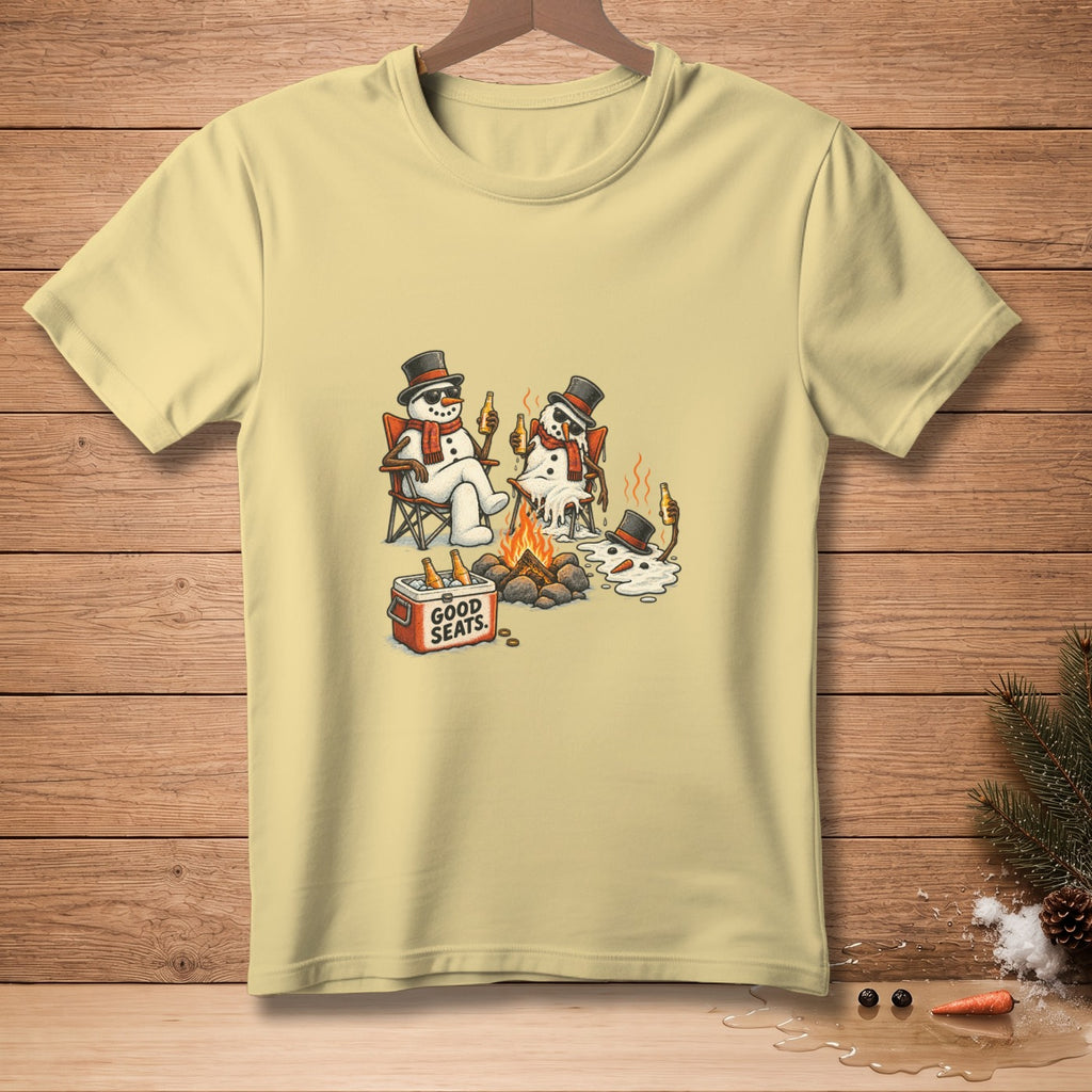 T-shirt graphic of melting snowmen with top hats by a campfire, text "GOOD SEATS".