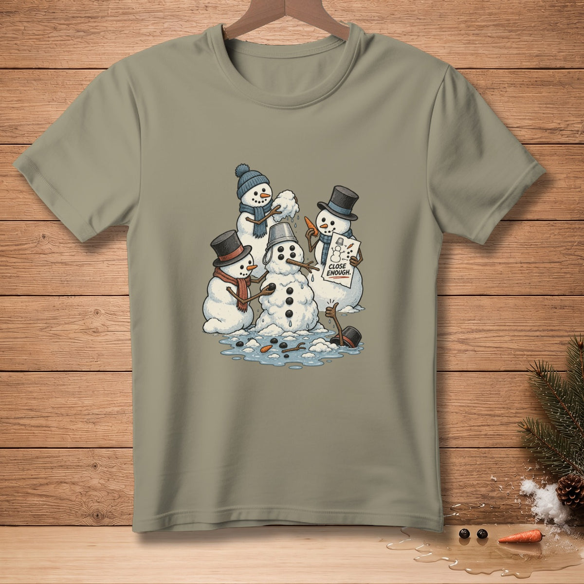 Four snowmen are built, one holding a "CLOSE ENOUGH" sign.