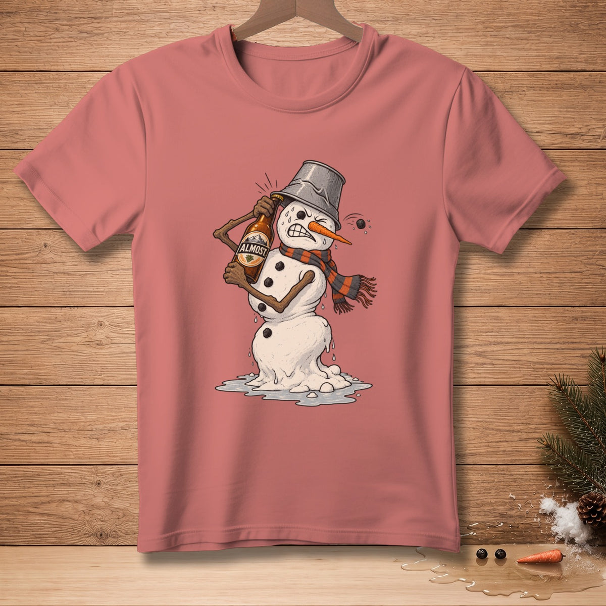 Snowman with bucket hat, scarf, and bottle of "ALMOST" beer, melting on a shirt.