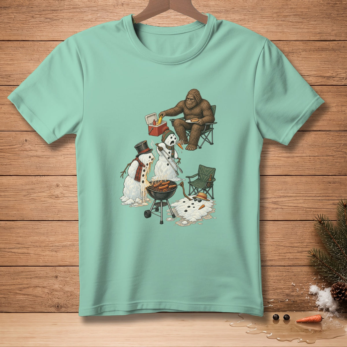 Bigfoot grilling hot dogs while snowmen melt around a barbecue.