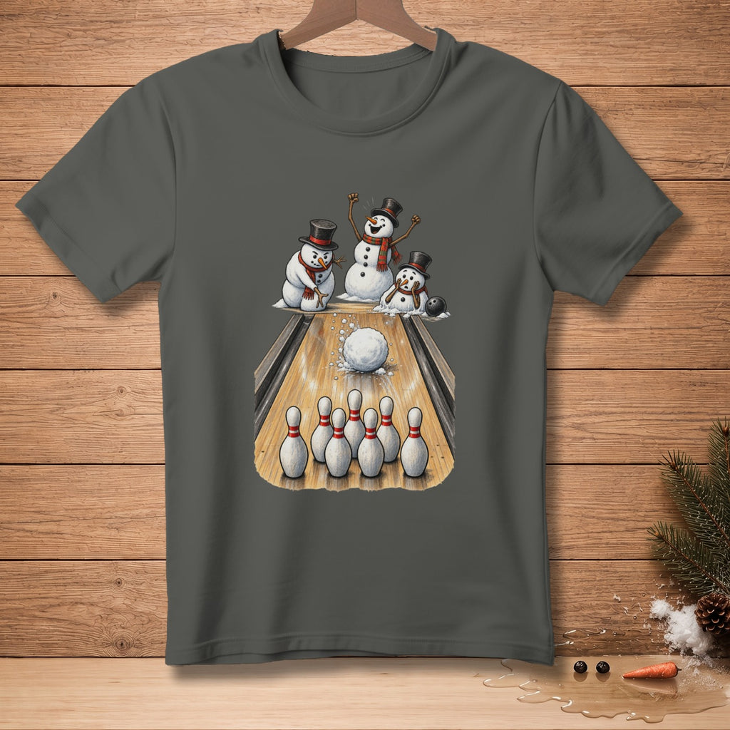 Three snowmen bowling on a wooden lane with pins and a ball.
