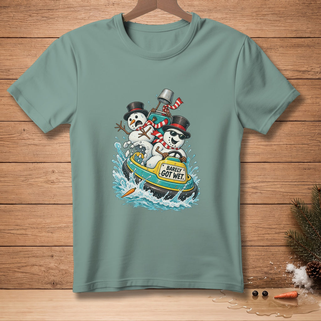 Snowmen in a jet boat with "Barely Got Wet" text on a blue t-shirt.