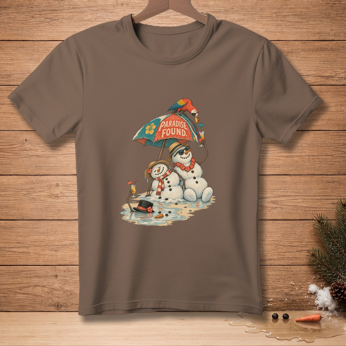 Two snowmen with drinks under an umbrella with a parrot and text "Paradise Found".