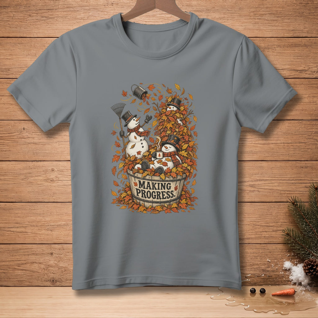 Snowmen in autumn leaves with "Making Progress" text on a gray t-shirt.