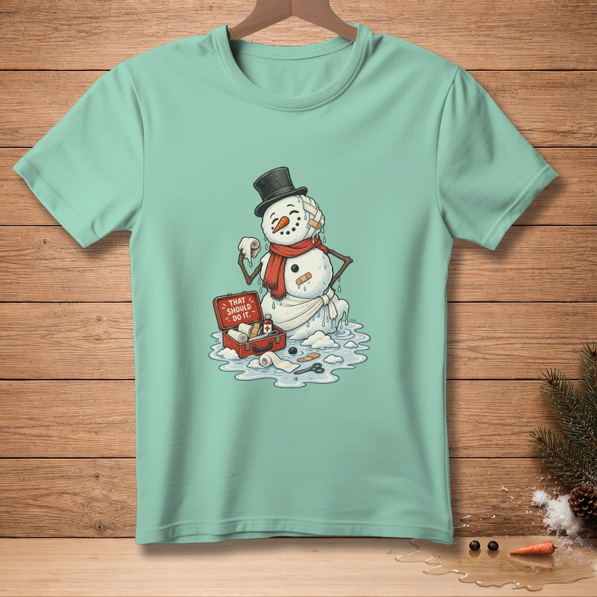 T-shirt with melting snowman bandaged from a first-aid kit.
