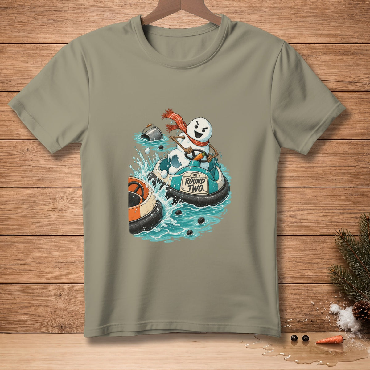 Snowman driving a bumper boat with a scarf and "ROUND TWO." text.