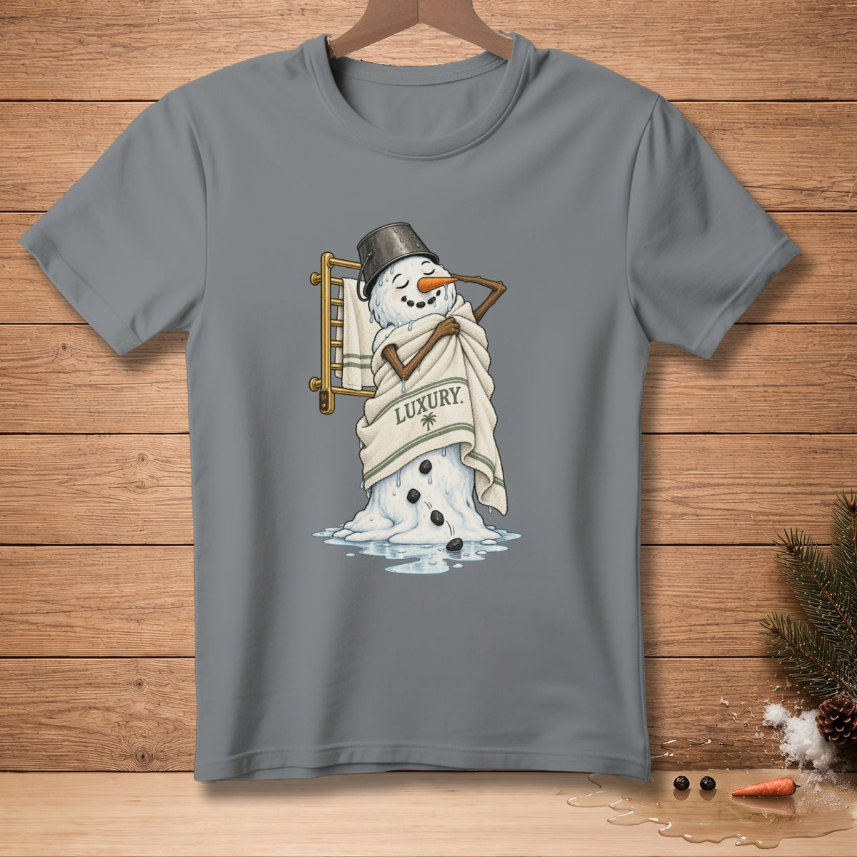 Snowman with bucket hat wrapped in a towel reading "LUXURY".