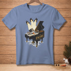 Snowman playing piano with spotlights and "Encore" text on a blue t-shirt.