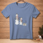 T-shirt graphic of snowmen with sashes: Miss Winter, Miss Spring, and melting Miss July.