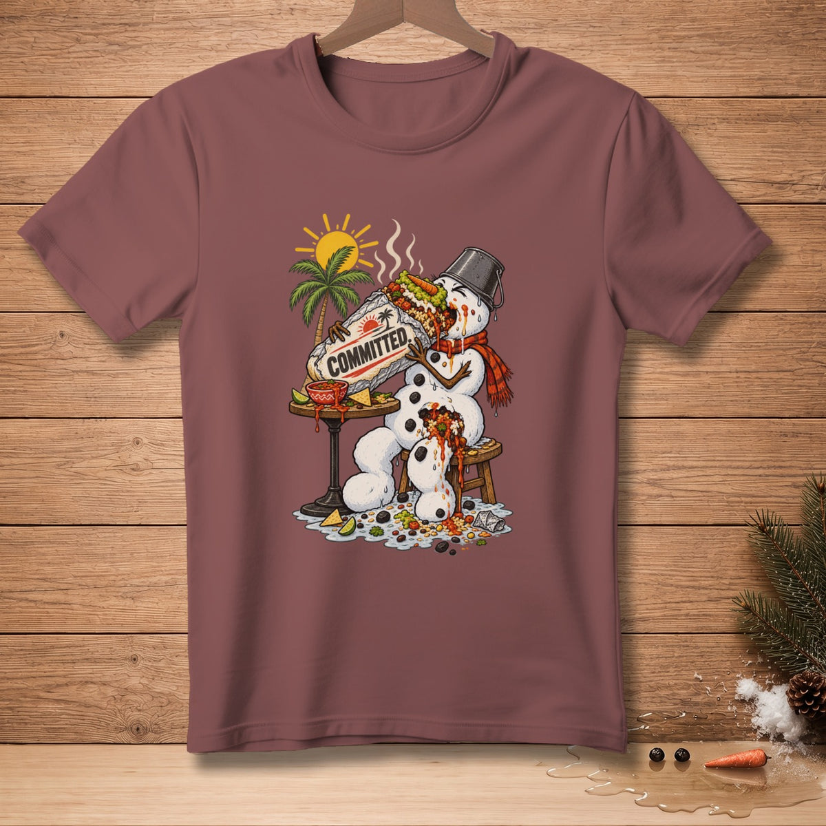 Snowman eating a burrito labeled "COMMITTED" with a tropical background.