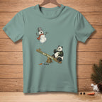 Melting snowman on seesaw with panda eating bamboo. Text reads "MY TURN."