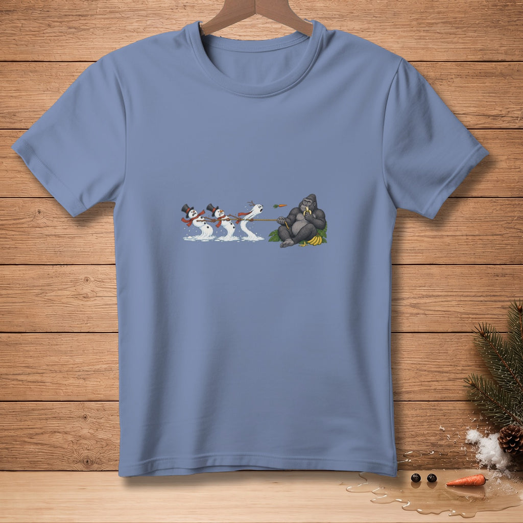 Snowmen pull a rope towards a gorilla sitting and eating a banana.