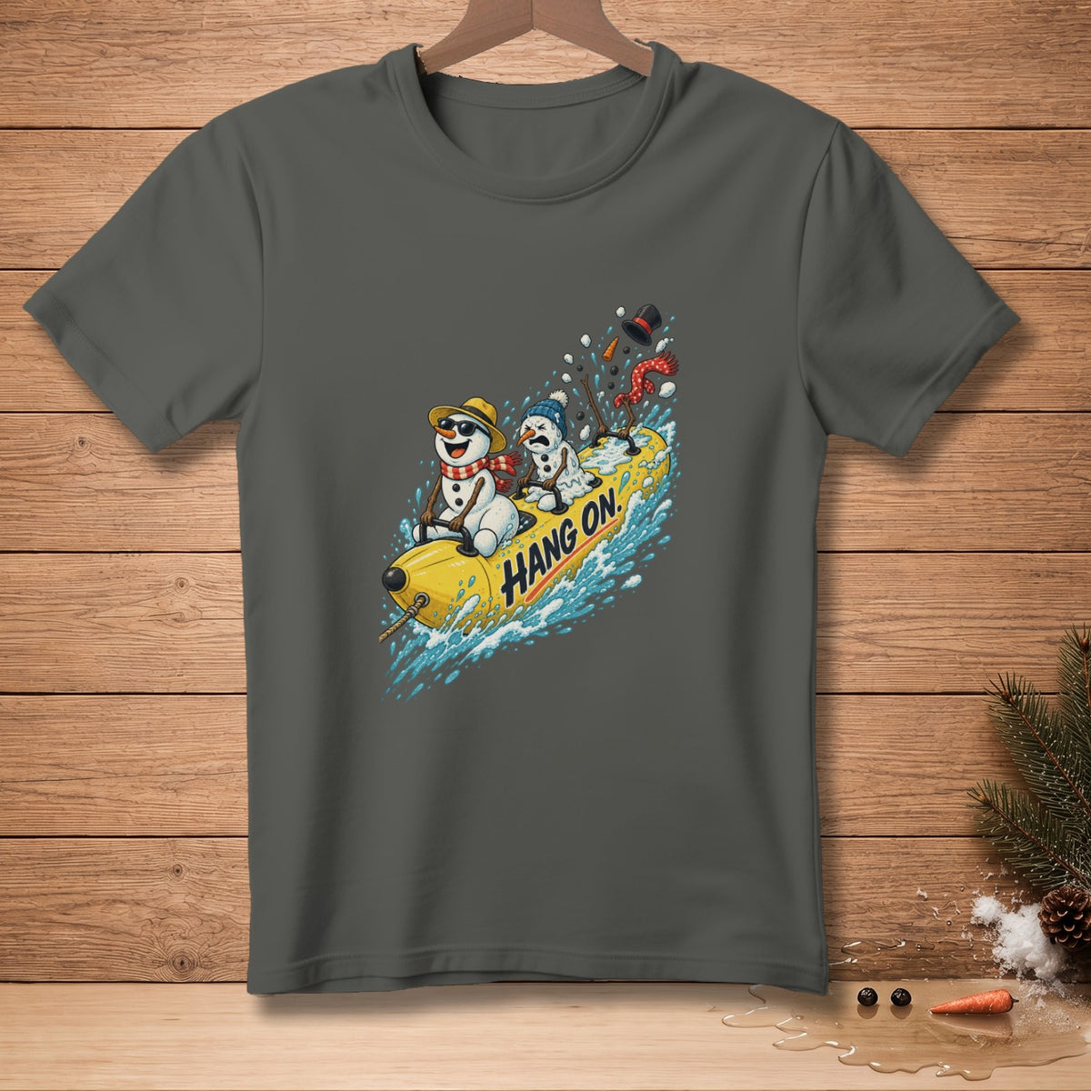 Two snowmen ride a yellow tube through water with "Hang On" text.