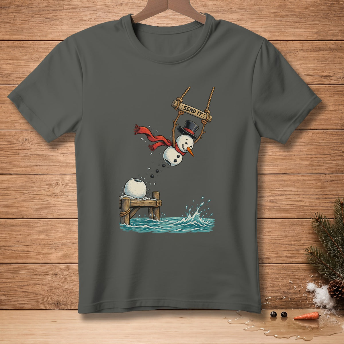 Snowman on a swing with "SEND IT." text, jumping into water.