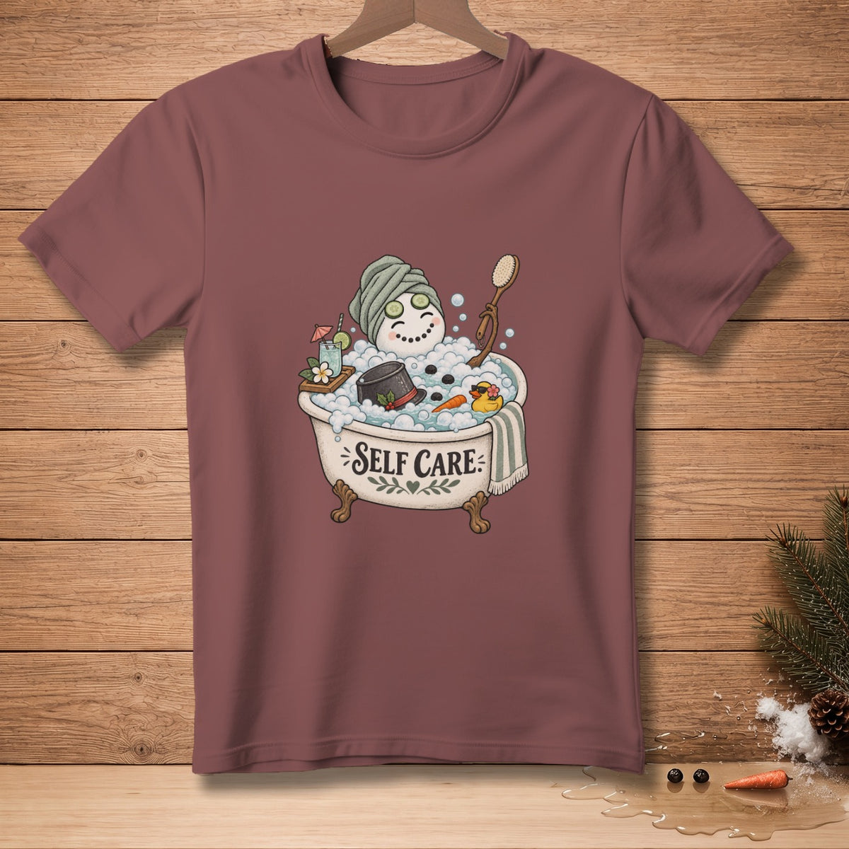 T-shirt with cartoon snowman in bathtub with text "Self Care".
