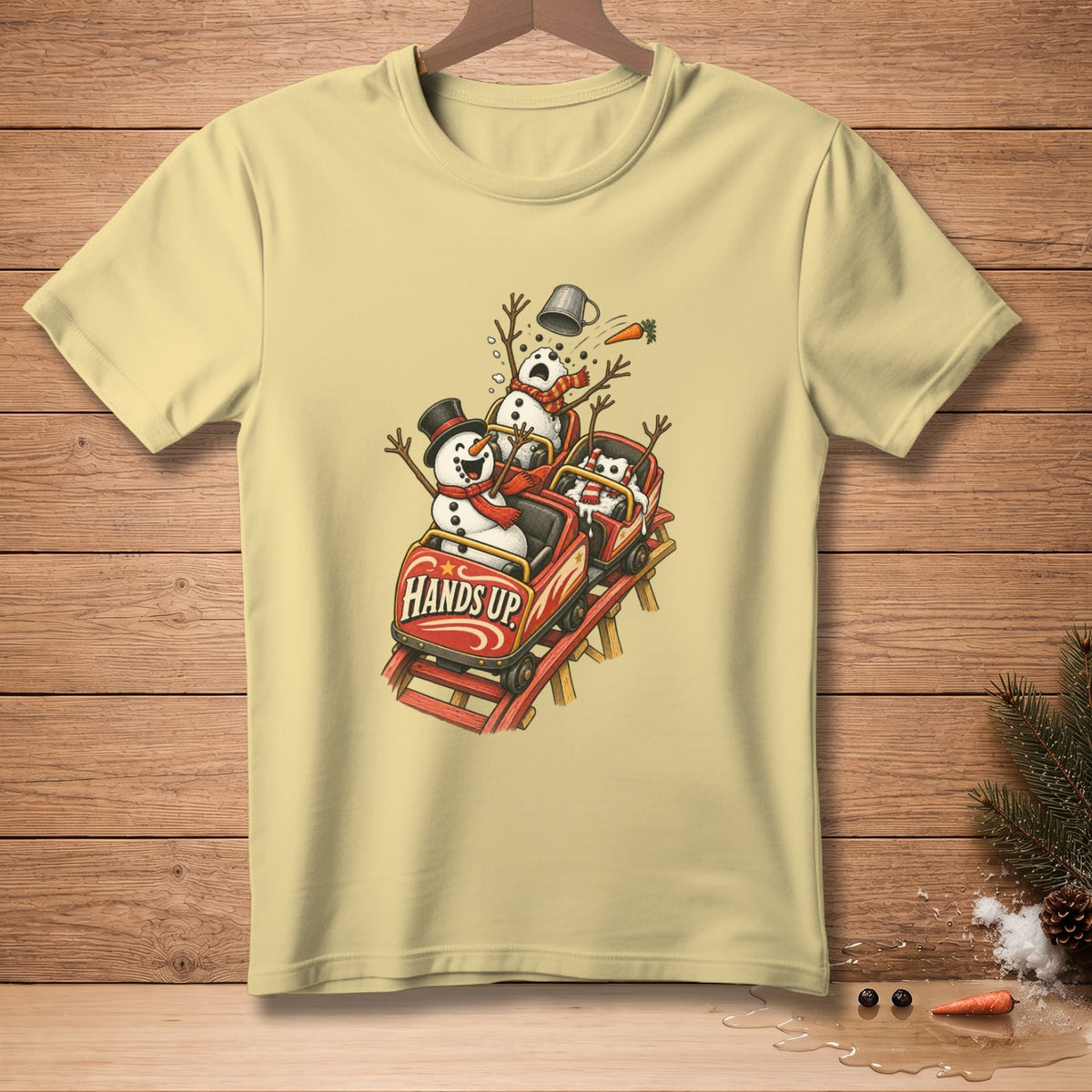 Snowmen riding a roller coaster with "Hands Up" text on the car.