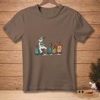 Snowman wearing sunglasses and a hat rides a scooter, pulling luggage, with "TRAVEL LIGHT" text.