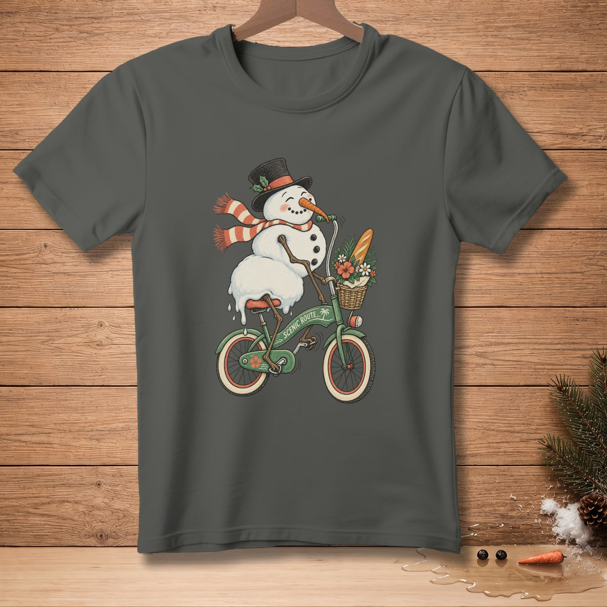 Snowman wearing a hat and scarf rides a bicycle with a basket of flowers and bread.