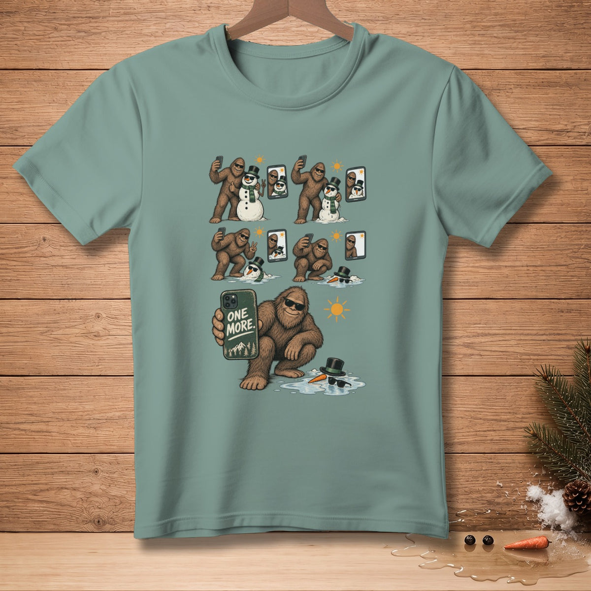 Bigfoot taking selfies with snowmen, holding phone with "ONE MORE" text.