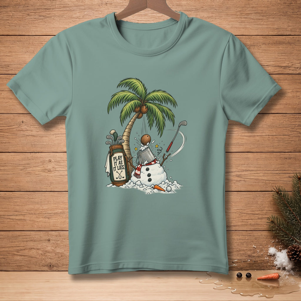 T-shirt graphic: snowman with golf club, palm tree, and "PLAY IT AS IT LIES" text.