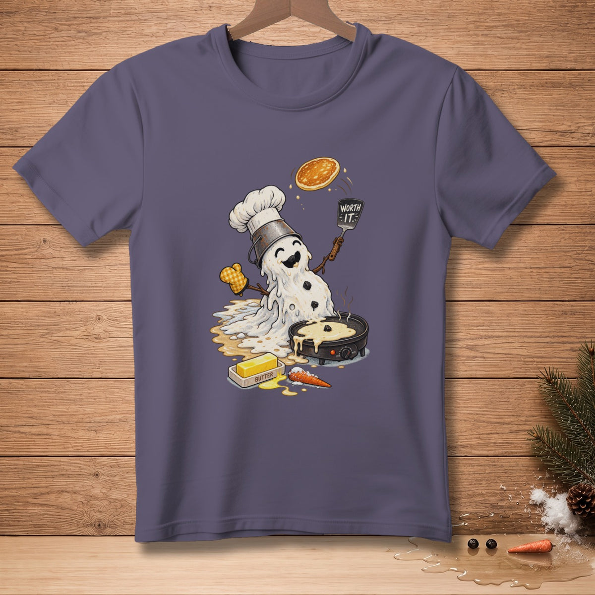 Melting snowman chef flipping pancake with "WORTH IT." spatula.
