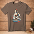 Brown t-shirt with a graphic of snowmen sailing a boat labeled "CAPTAIN'S ORDERS".