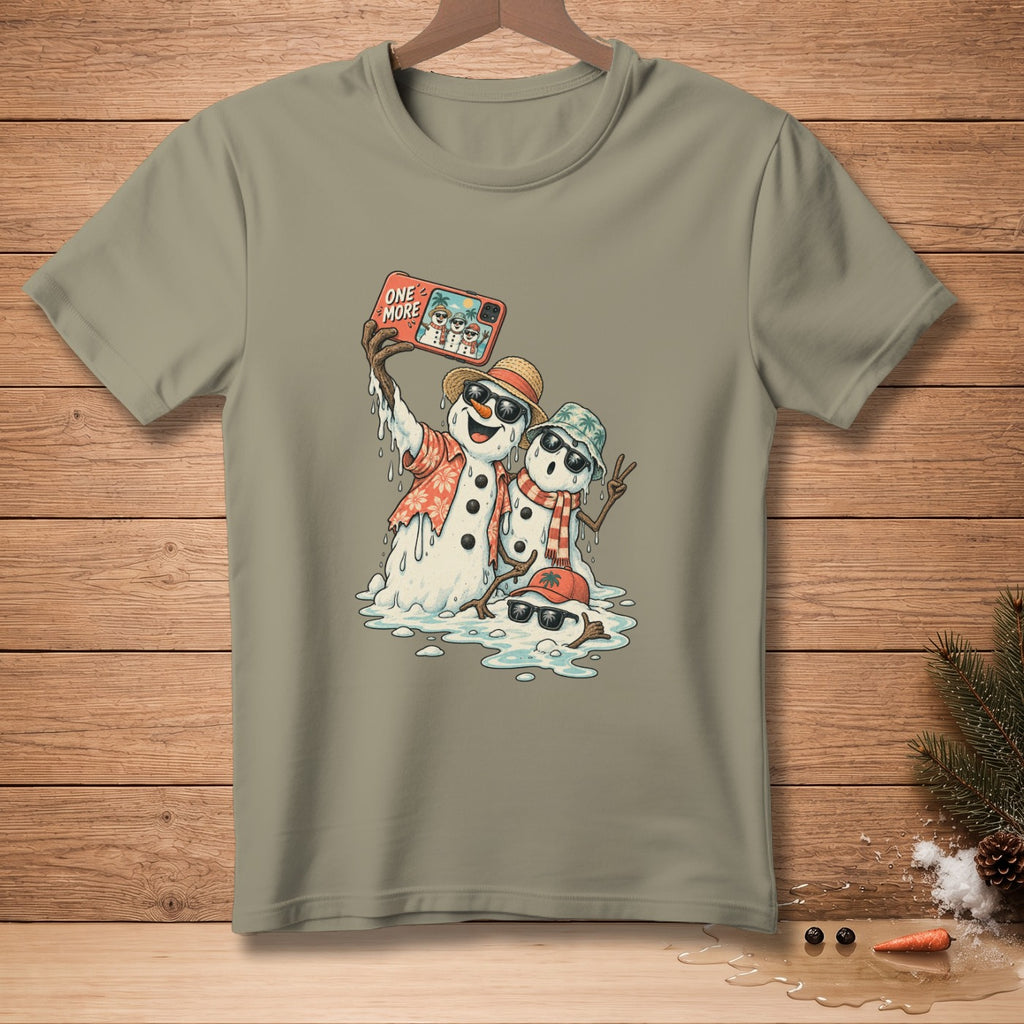 T-shirt graphic of melting snowmen taking a selfie with "ONE MORE" text.