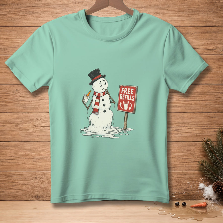 Melting snowman with carrot arm and "Free Refills" sign on light blue t-shirt.