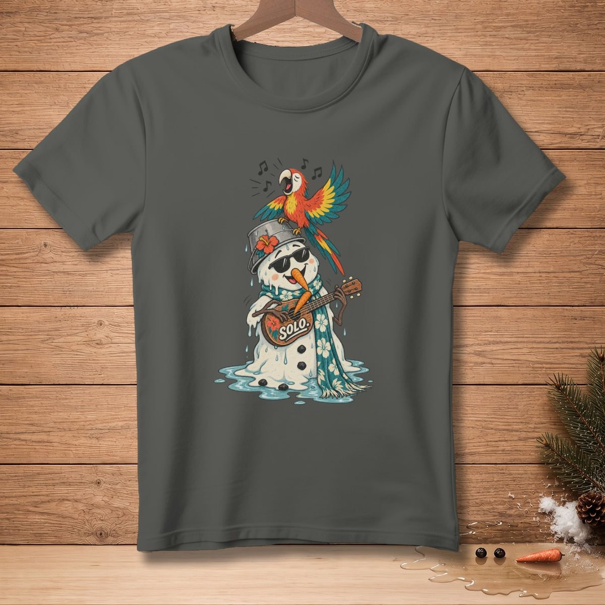 Melting snowman playing ukulele with parrot singing on a grey t-shirt.