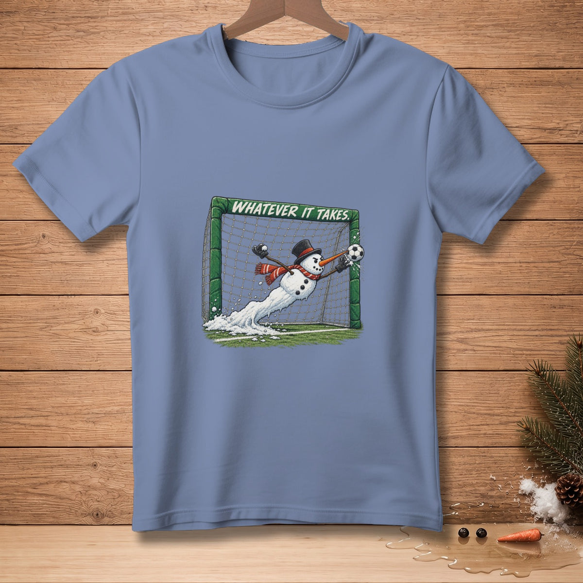 Snowman goalie dives for soccer ball with "Whatever It Takes" text.