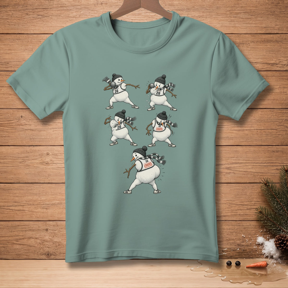 T-shirt with five humorous snowmen playing sports, some with numbers and text.