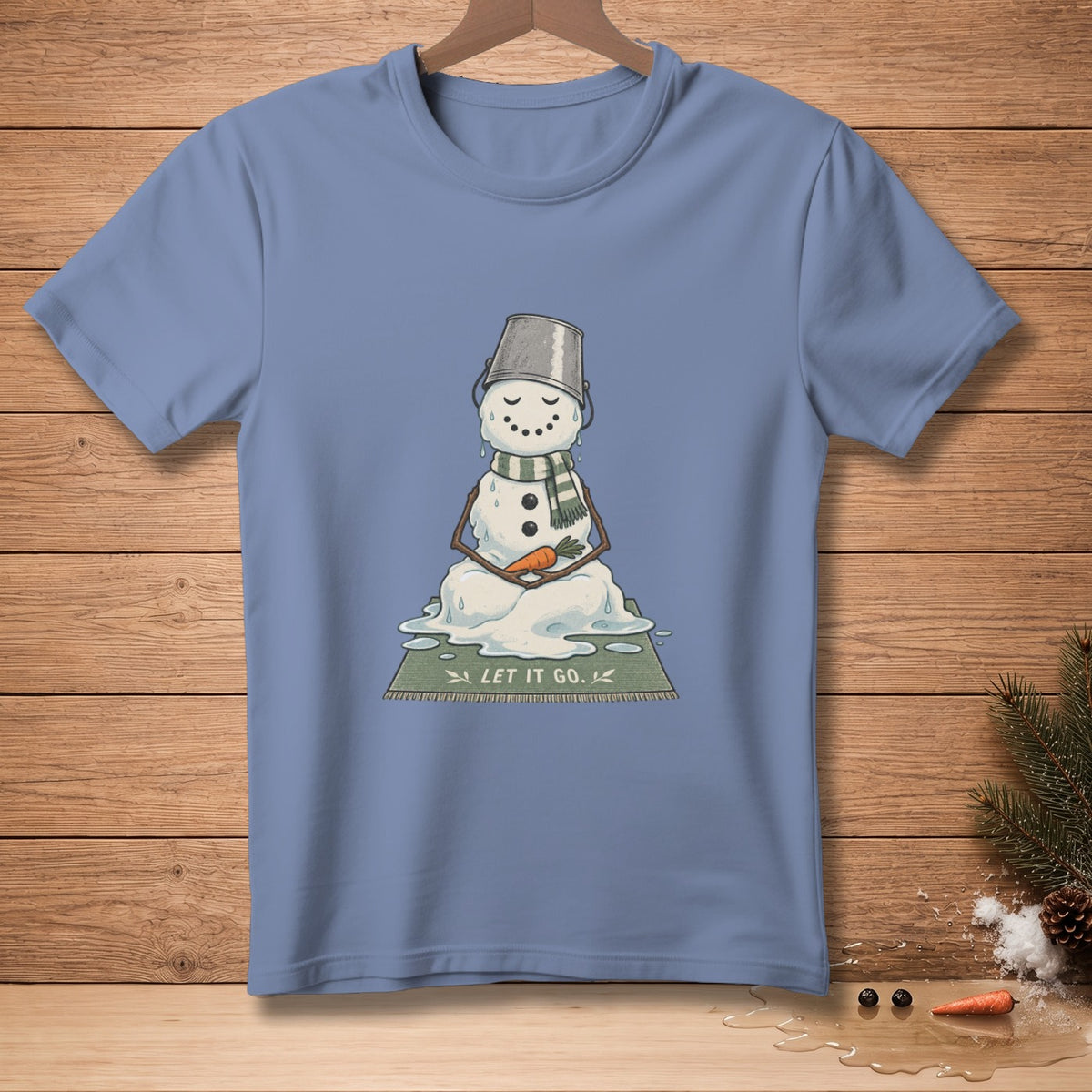 Melting snowman in meditation pose with bucket hat and text "LET IT GO."
