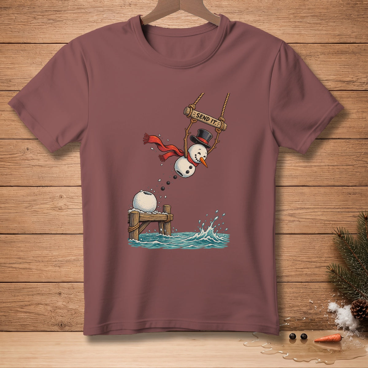 Snowman on a swing with "SEND IT." text, jumping into water from a dock.