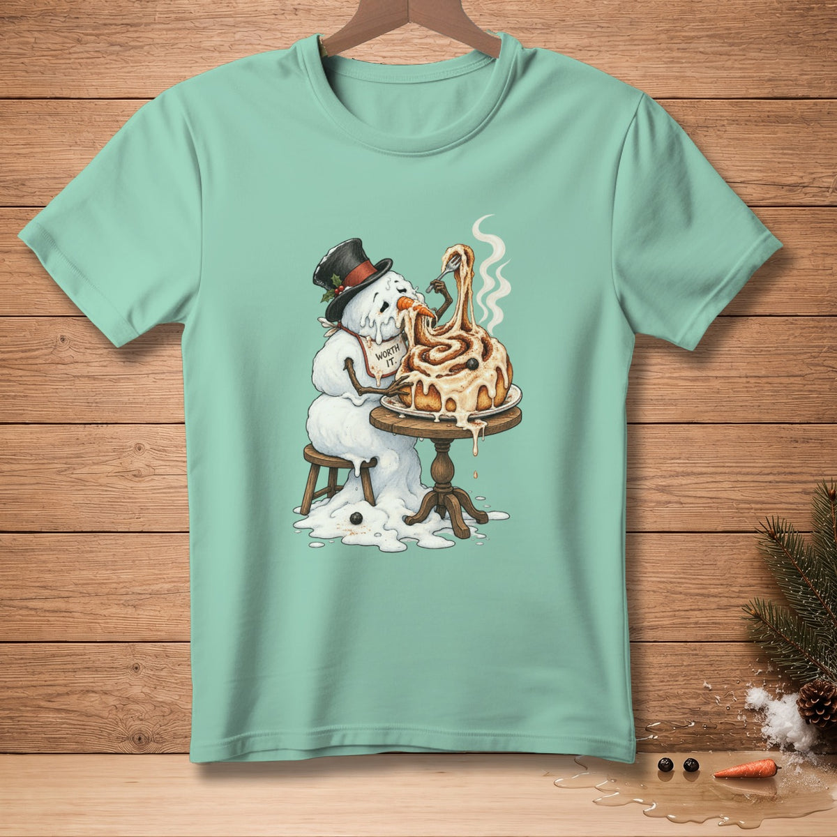 Snowman in top hat eating a large cinnamon roll with fork, text "WORTH IT."
