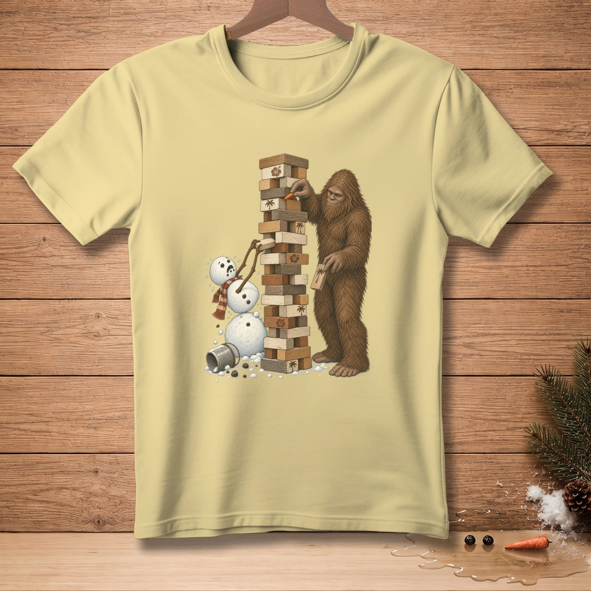 Bigfoot playing Jenga with a snowman near a pile of blocks.
