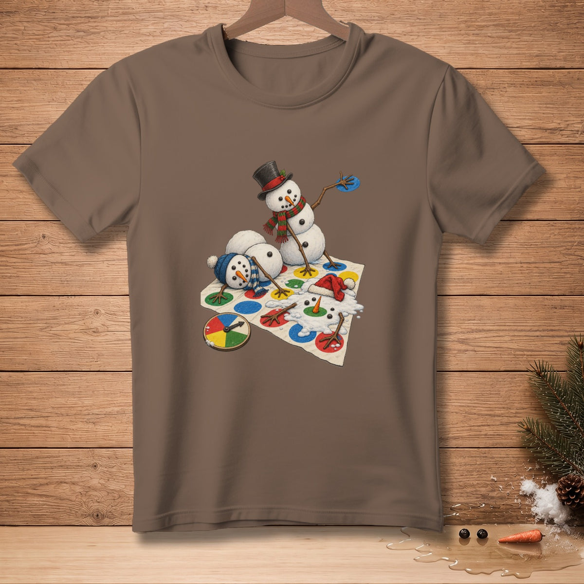 Brown t-shirt with cartoon snowmen playing Twister on a mat.
