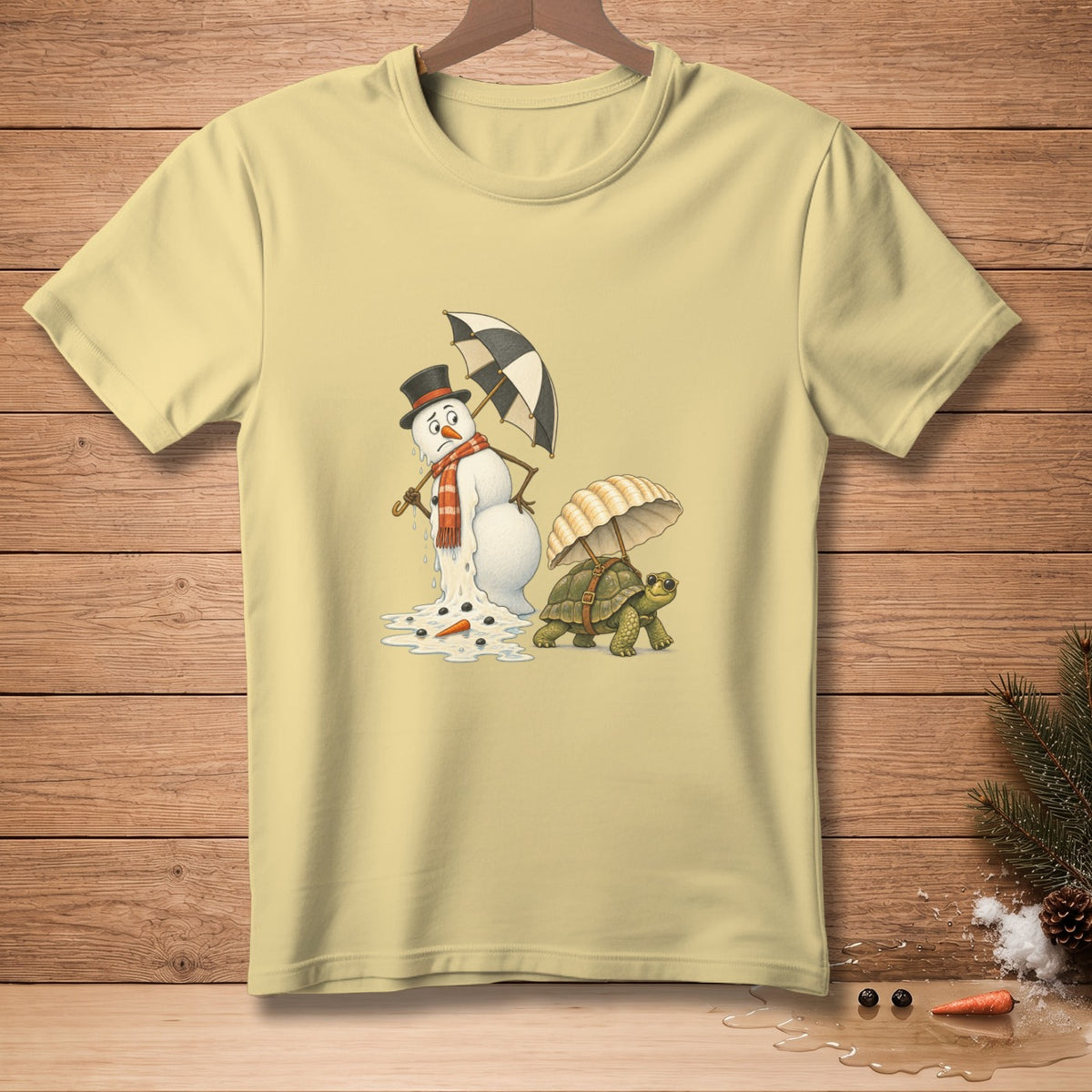 T-shirt with melting snowman holding umbrella and turtle with parachute umbrella.