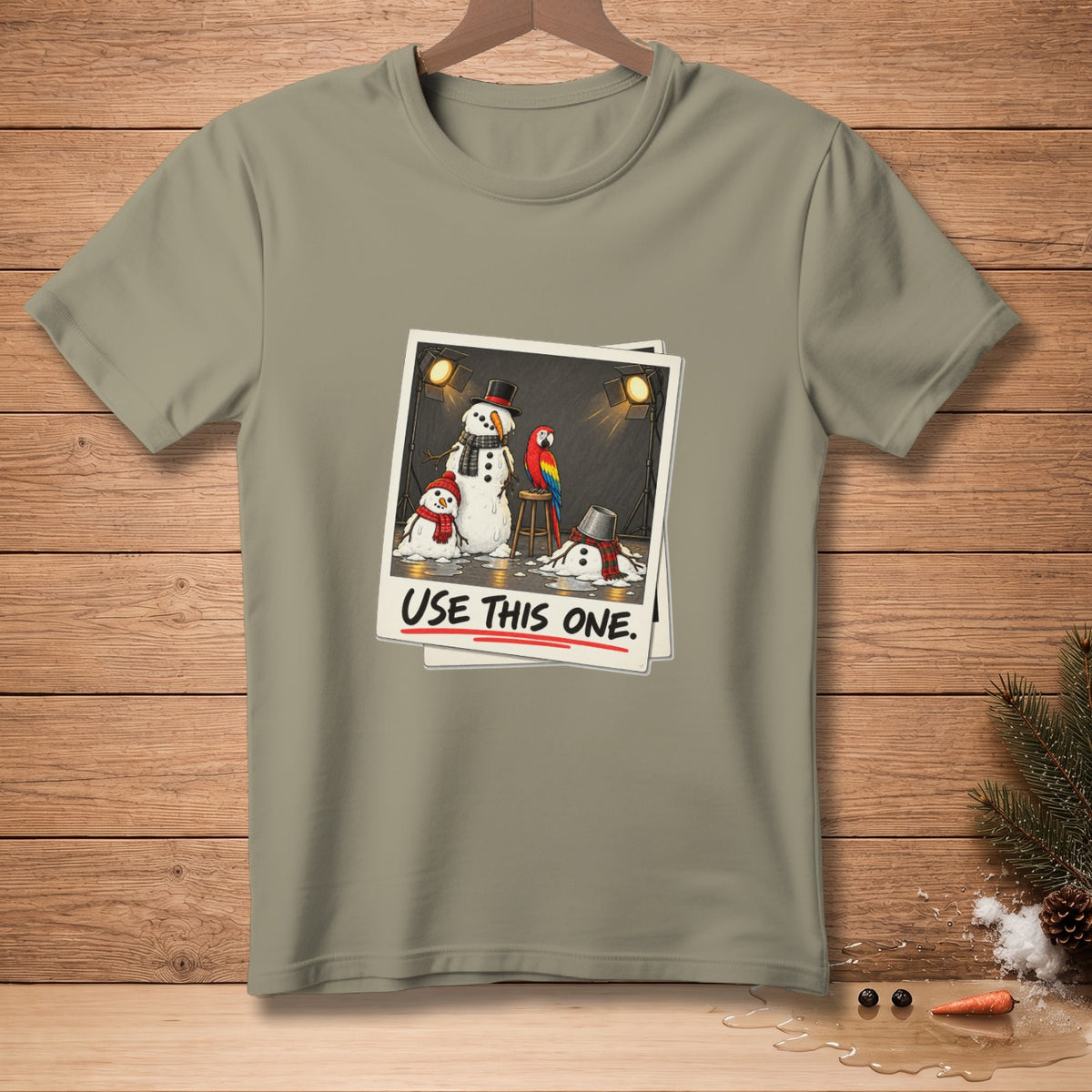 Illustration of snowmen on a stage with a parrot and text "USE THIS ONE."