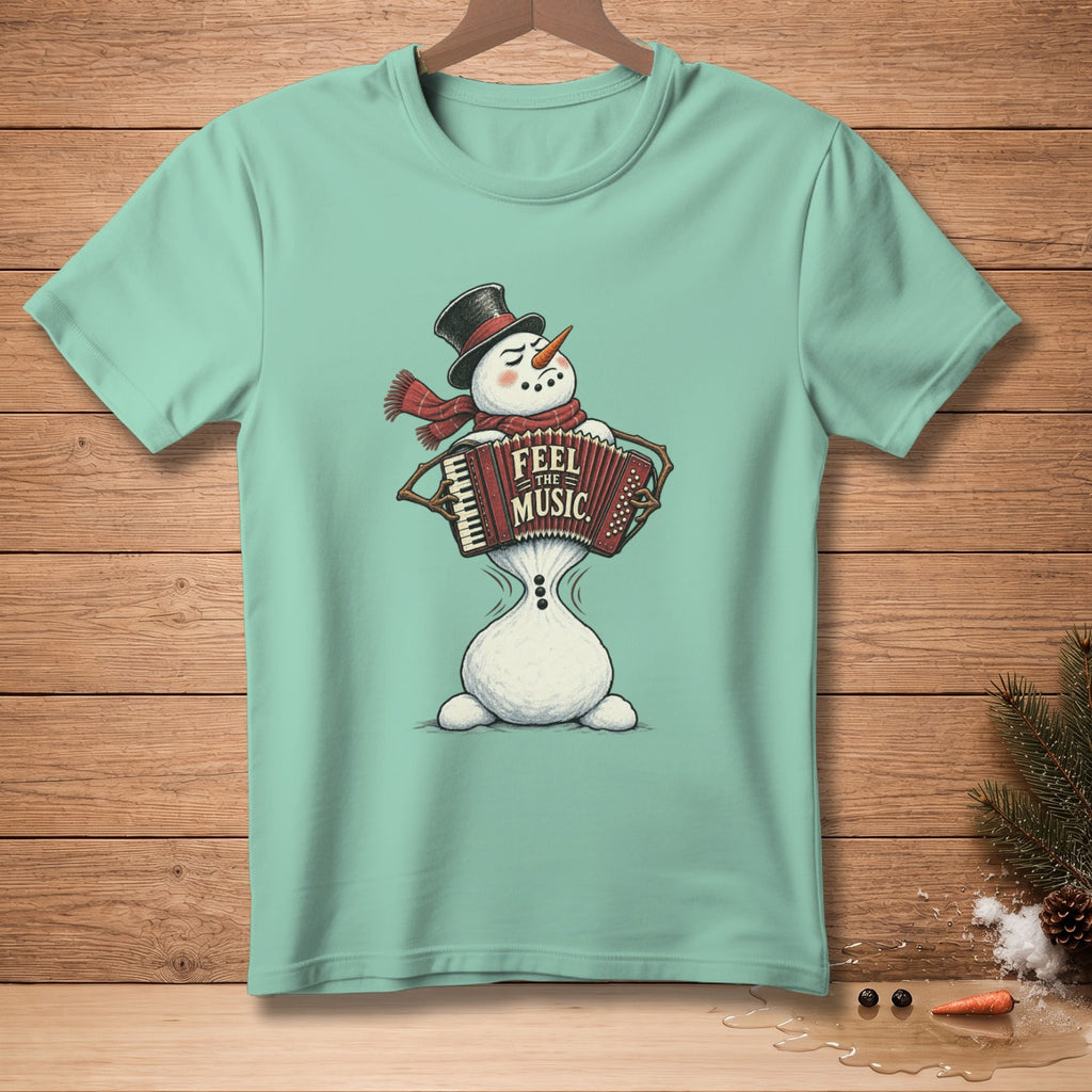 Snowman in top hat playing accordion with "Feel the Music" text on light blue shirt.