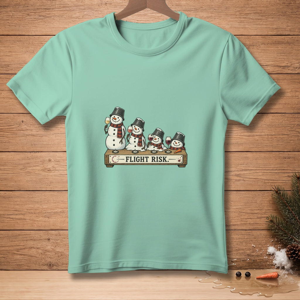 Mint green t-shirt with snowmen drinking wine and text "FLIGHT RISK."