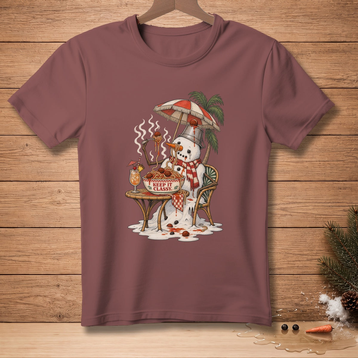 Snowman eating spaghetti under an umbrella with "Keep It Classy" text.