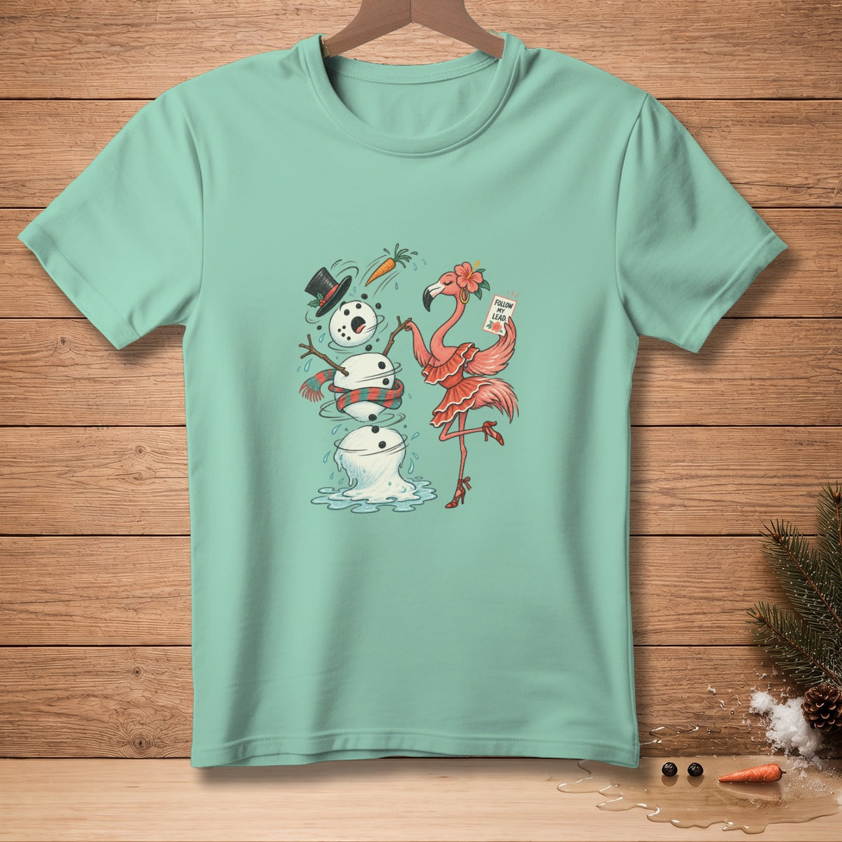 Flamingo leading a melting snowman in a whimsical holiday design.