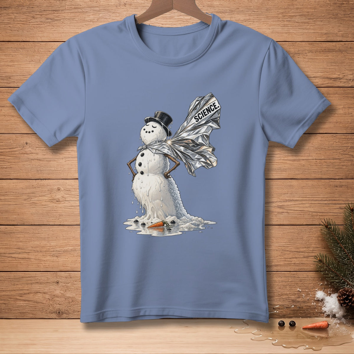 Melting snowman with foil wings and text "SCIENCE" on a blue t-shirt.